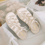 INÉS™ | SANDALIAS GLADIADORAS MARRÓN EN CUERO